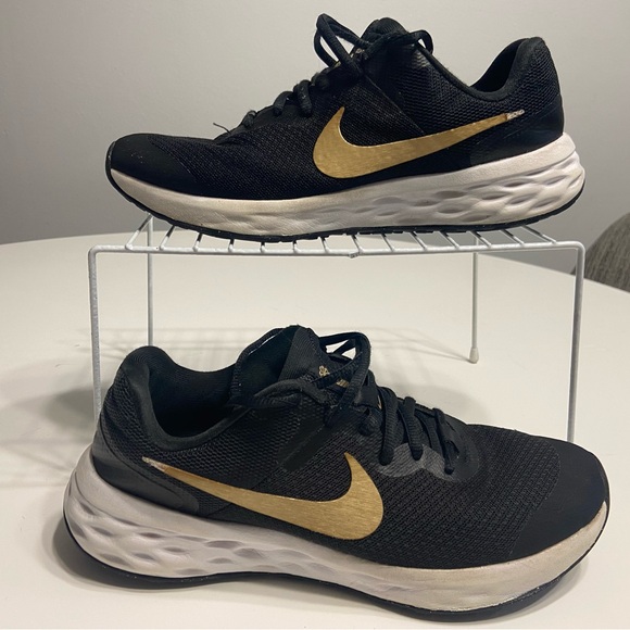 Nike Black with Gold Swoosh Running Shoes - Picture 1 of 5